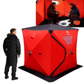 Red and black portable fishing shelter with a person standing next to it and another inside using it.