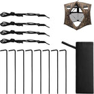 Hunting blind kit with camouflage pattern canopy, four black power cords, eight black stakes, and a black carrying bag on a white background.