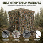 A camouflage hunting blind tent shown outdoors in a forest setting, with marketing text at the top and four circular feature callouts at the bottom highlighting durable fiber support rods, advanced composite fabric, reinforced center hub, and heavy-duty wind rope.